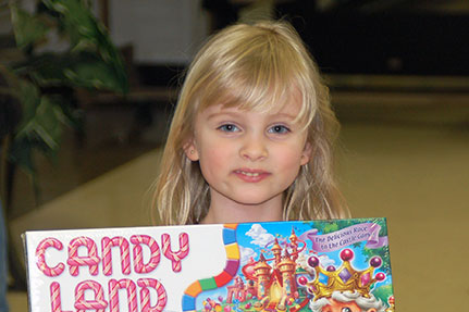 Little Girl with Candy Land Board Game